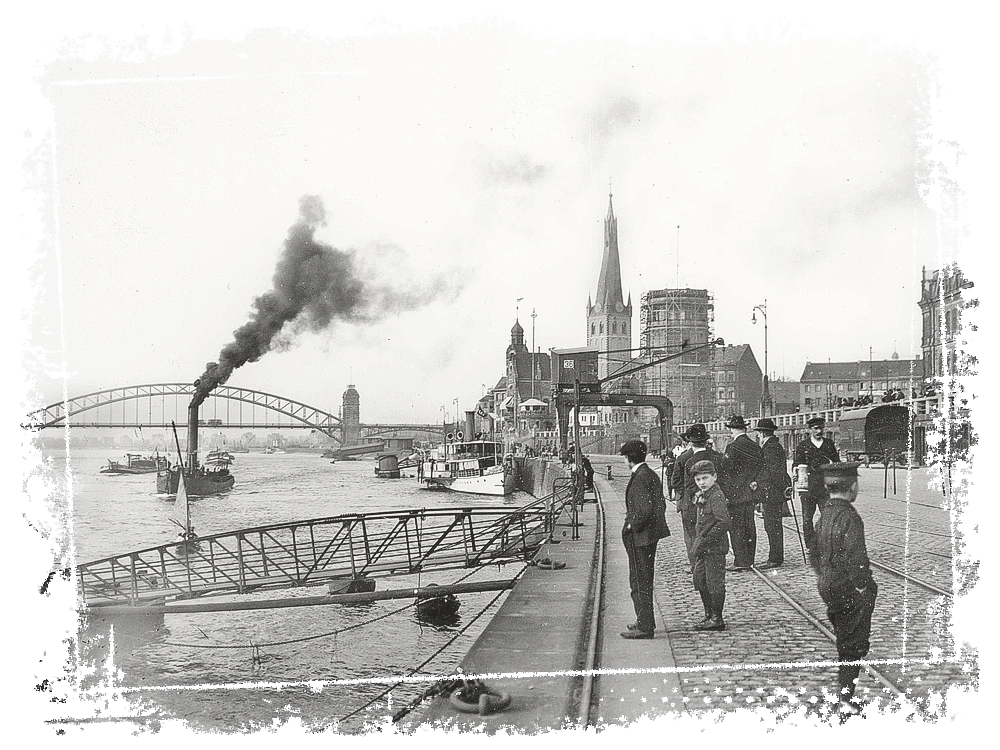Historisches Bild auf den Burgplatz mit Rheindampfer und Männern am Ufer